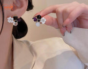 Bông tai ngọc hoa tím đá đen