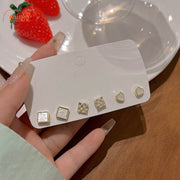 Set khuyên vuông ẩn xà cừ