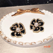 Cài áo hoa đen đính đá nhuỵ ngọc