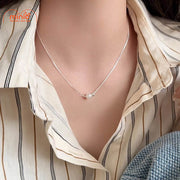 Dây chuyền titan 042 hạt ngọc trai +bi MH