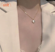 Dây chuyên nơ ngọc trong tim