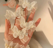 Set 2 kẹp bướm ren trắng