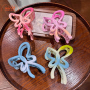 Kẹp càng cua bướm nơ màu loang