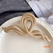 Kẹp càng cua nơ sóng