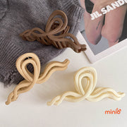 Kẹp càng cua nơ sóng