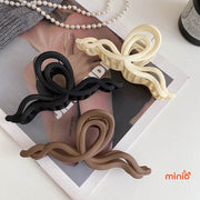 Kẹp càng cua nơ sóng