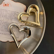 Kẹp càng cua kim loại trái tim