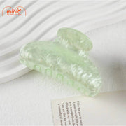 Kẹp càng cua trăng khuyết màu xà cừ