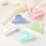 Kẹp càng cua trăng khuyết màu xà cừ