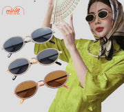 Kính mát gọng oval viền nhũ