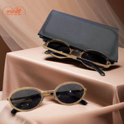 Kính mát gọng oval viền nhũ