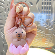 Móc khoá Capybara đài sen xoay