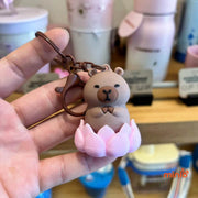 Móc khoá Capybara đài sen xoay