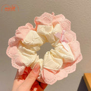 Scrunchies vải nơ hồng bèo tim