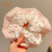 Scrunchies vải họa tiết  nhiều nơ