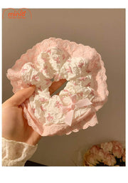 Scrunchies vải họa tiết  nhiều nơ