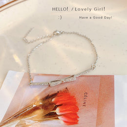 Lắc tay nơ đồng mạ bạc FL