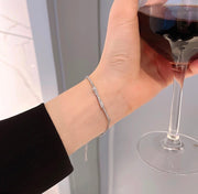 Lắc tay nơ đồng mạ bạc FL