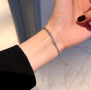 Lắc tay nơ đồng mạ bạc FL