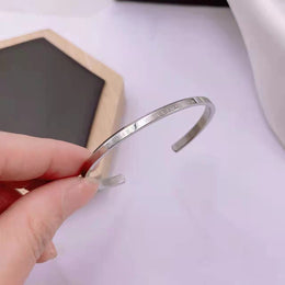 Lắc tay titan DW bạc, vàng