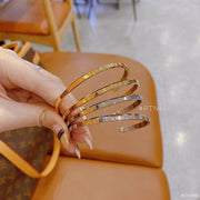 Lắc tay titan DW bạc, vàng