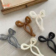 Kẹp càng cua nơ nhựa