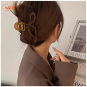 Kẹp càng cua nơ nhựa