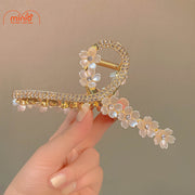 Kẹp càng cua kim loại gắn hoa