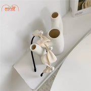 Cài nơ 3 hạt ngọc