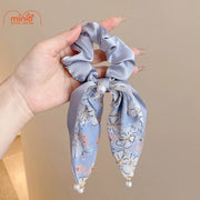 Dây cột tóc nơ đính ngọc trai