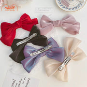 Kẹp tóc nơ voan ánh nhũ