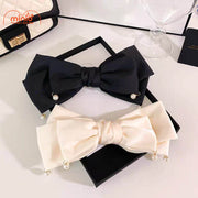 Kẹp tóc nơ tua hạt ngọc