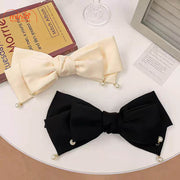 Kẹp tóc nơ tua hạt ngọc