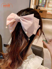 Kẹp tóc nơ tua hạt ngọc