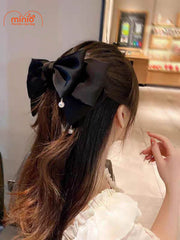 Kẹp tóc nơ tua hạt ngọc