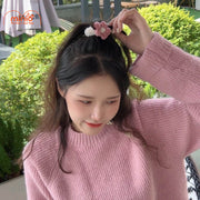 Cột tóc lông hoa len