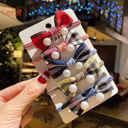 Dây cột tóc nơ kẻ đính ngọc