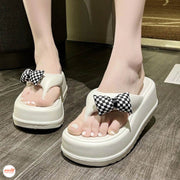 Dép kẹp đế xuồng 7cm nơ hồng