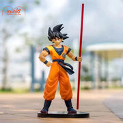 Son Goku cầm gậy
