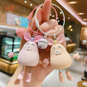 Móc khóa bé tay chân lò xo