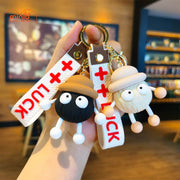 Móc khóa bé 2 mắt dây Luck