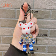 Móc khóa gấu mặc áo đính đá