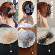 Kẹp càng cua kim loại nơ ngọc trai