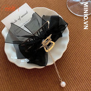 Kẹp càng cua kim loại nơ ngọc trai