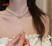 Choker ngọc trai nơ đính đá FL