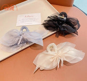 Kẹp càng cua nơ voan