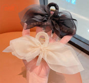 Kẹp càng cua nơ voan