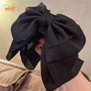 Kẹp tóc nơ đen 3 tầng