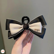 Kẹp càng cua nơ vải Min