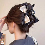 Kẹp càng cua nơ vải Min